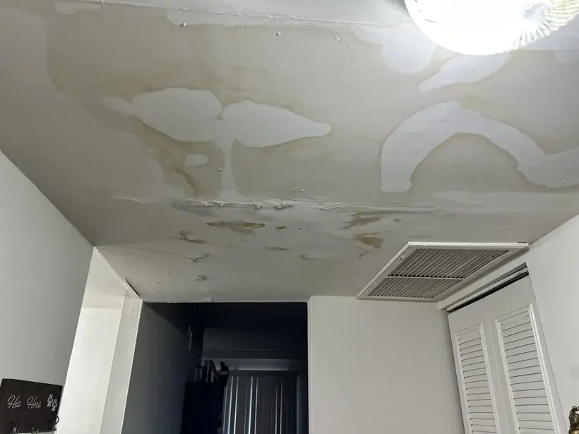 Water stains spreading across a ceiling after a leak above in Alhambra